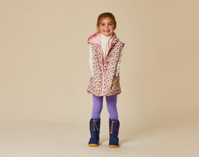 Child wearing sleeveless Snapper Rock - 2 in 1 Puffer Jacket & Vest - Leopards - Available at www.tenlittle.com