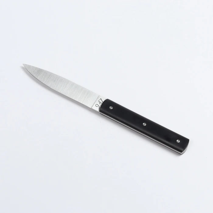 9.47 Steak Knife by Perceval in  black on white background.