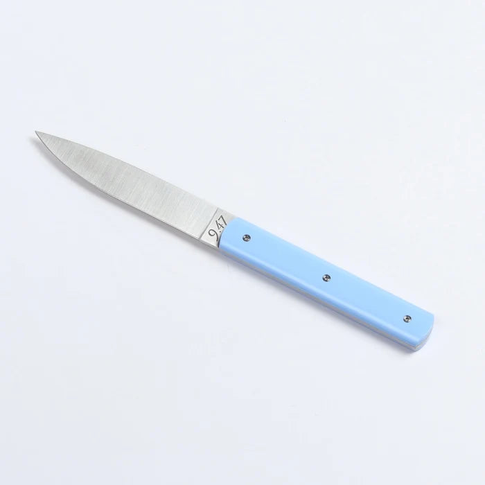 9.47 Steak Knife by Perceval in Lavender blue on white background.