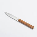 9.47 Steak Knife with Olive Wood Handle by Perceval on white background.