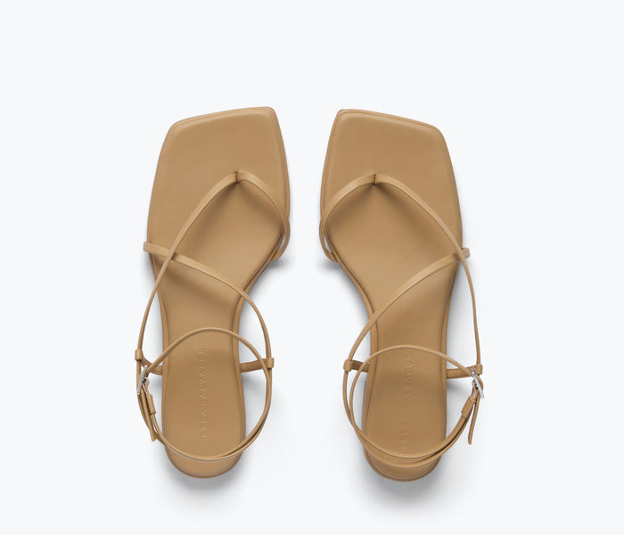 Freda Salvador Alexia sandal in latte color, featuring a stylish open-toe design and ankle strap, on a neutral background.