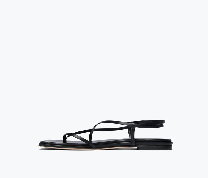 FREDA SALVADOR Alexia black calf leather sandal with inside view showing sleek design and ankle strap detail.