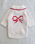 Festive ivory dog sweater with red bow detail and charming Peter Pan collar for small to medium breed dogs