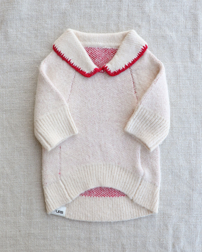 Cute ivory knit dog sweater featuring a red bow and classic Peter Pan collar for small to medium breed dogs