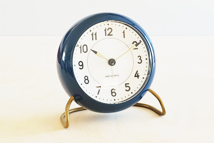 Classic Arne Jacobsen "AJ" Alarm Clock in blue AA batteries not included.