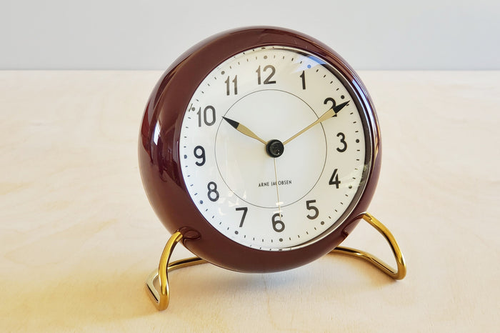 Classic Arne Jacobsen "AJ" Alarm Clock in burgundy red AA batteries not included.