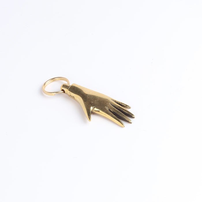 Side view of Hand keyring key chain by Carl Aubock.
