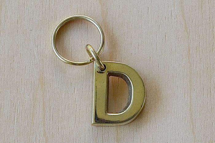 'D' Letter keyring, key chain, key ring in brass made by Carl Aubock.