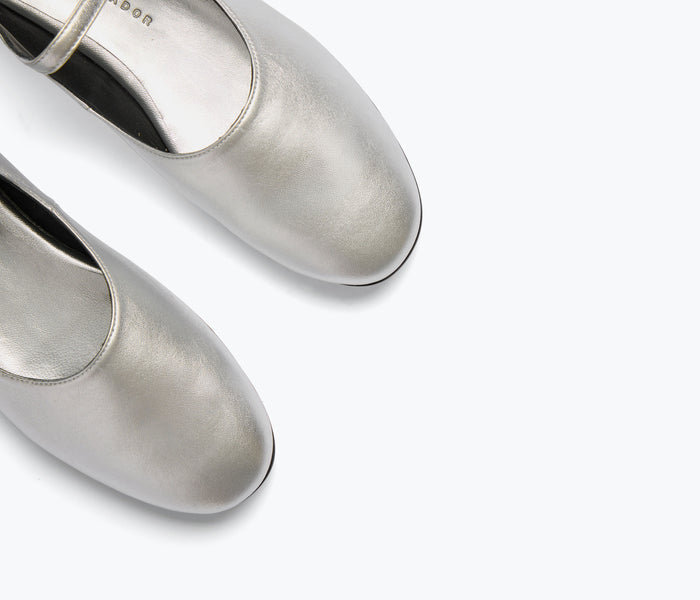 Freda Salvador Aubrey Mary Jane flat in silver with calf detail, featuring a classic strap and rounded toe.