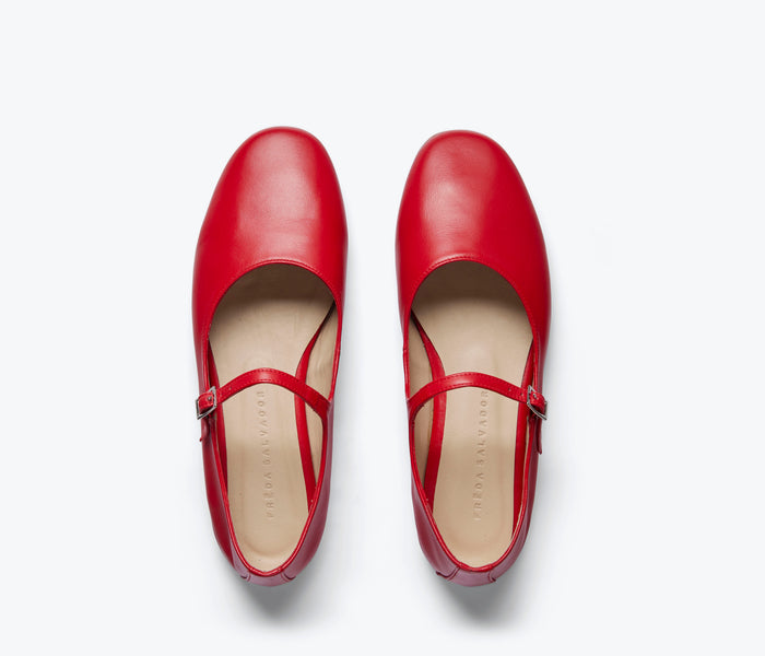 Red Freida Salvador Aubrey Mary Jane flat shoe with a sleek design and rounded toe, perfect for casual or dressy occasions.