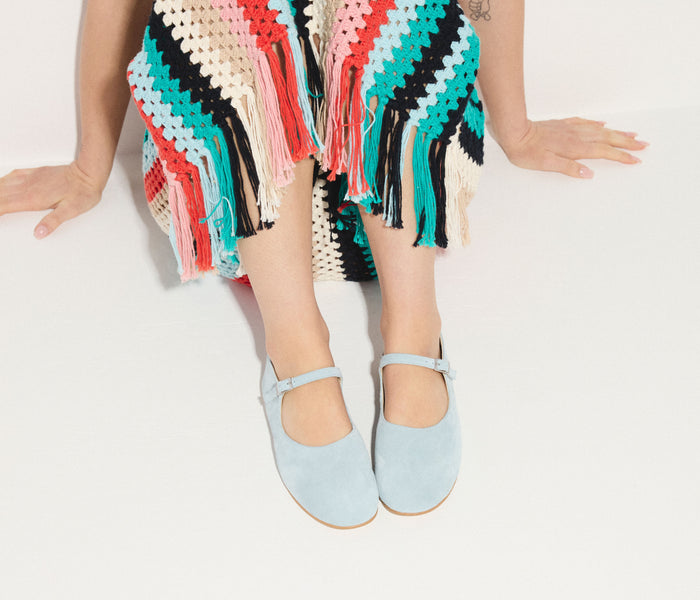 Blue suede Aubrey Mary Jane flat by Freda Salvador with a rounded toe and classic strap, showcased on a neutral background.