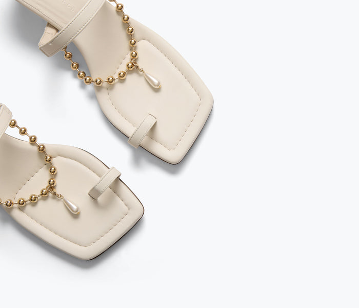 Freda Salvador Aurora heel sandal with macadamia-colored calf chain detail and stylish design.