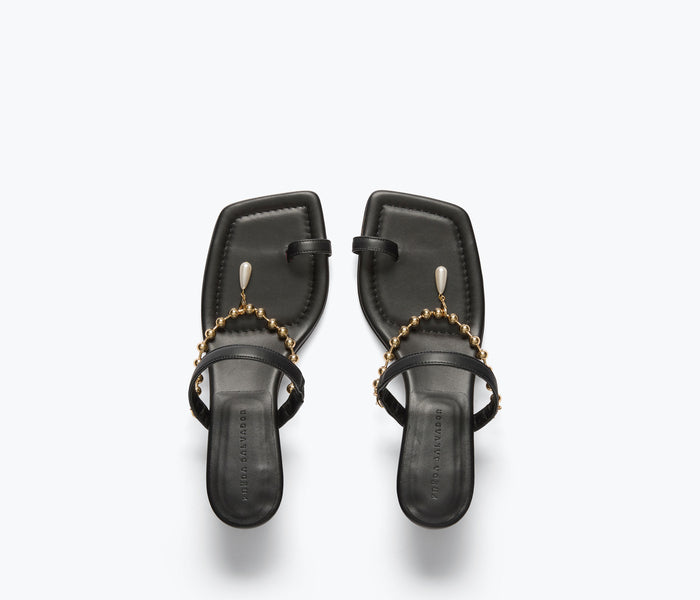 Black FREDA SALVADOR Aurora sandal heel with calf chain strap, showcasing stylish footwear design.