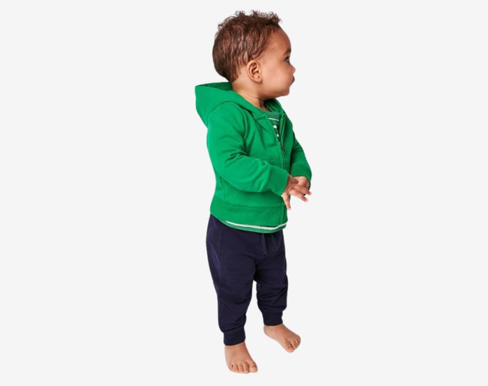 Baby wearing Primary Baby French Terry Jogger in Navy - 2 Pack - Navy / Cherry. Available at www.tenlittle.com