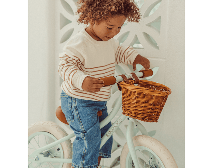 Child Riding Banwood Balance Bike Mint. Available at www.tenlittle.com