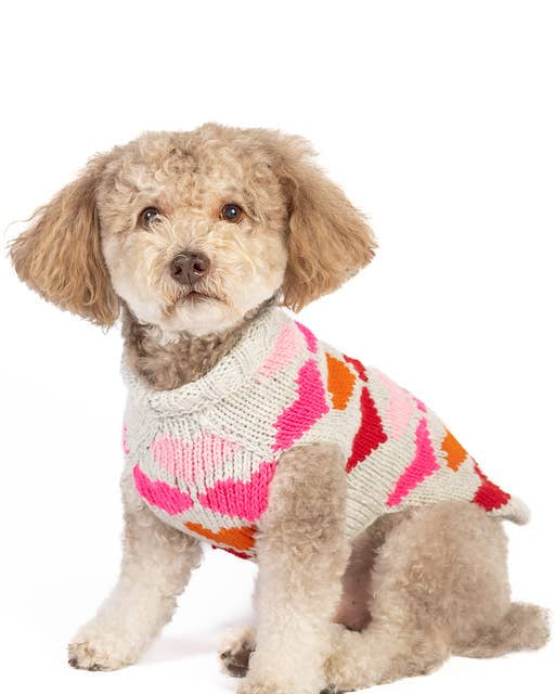 Cozy Valentine's Day dog sweater with heart print design.