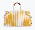 Freda Salvador Birdie Canvas Tote handbag in mustard and white with front design, made of durable canvas material.