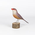 Bico de Lacre Bird from Brazil is a beautifully made fair trade wood bird modeled after birds from the region, this artisan makes them from reclaimed wood and supports his family by their production.