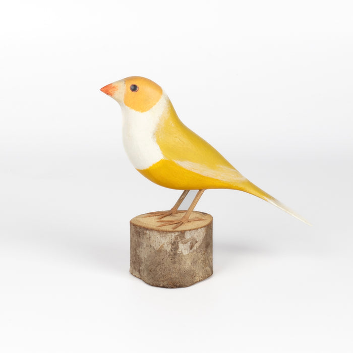 Diamante de Gould Yellow Bird from Brazil is a beautifully made fair trade wood bird modeled after birds from the region, this artisan makes them from reclaimed wood and supports his family by their production.
