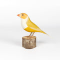Diamante de Gould Yellow Bird from Brazil is a beautifully made fair trade wood bird modeled after birds from the region, this artisan makes them from reclaimed wood and supports his family by their production.