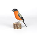 Peito Anaranjado Bird from Brazil is a beautifully made fair trade wood bird modeled after birds from the region, this artisan makes them from reclaimed wood and supports his family by their production.