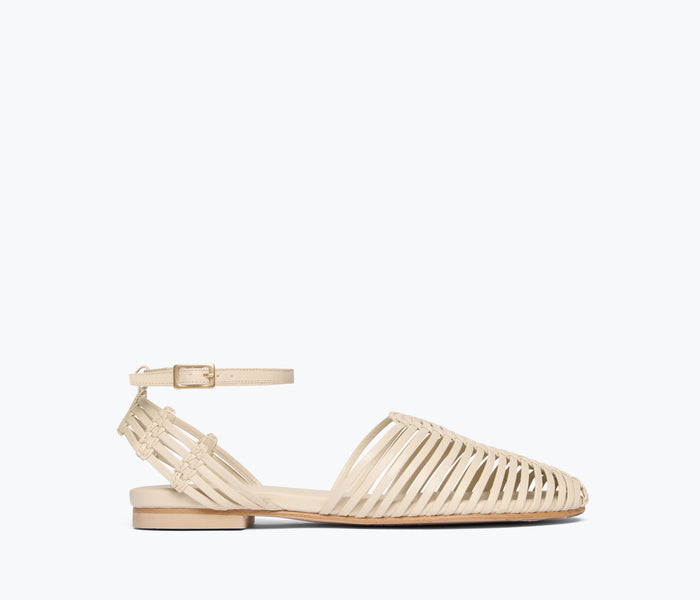 Freda Salvador Blake Caged Woven Flat in vanilla calf leather, showing front view with woven strap design and flat sole.