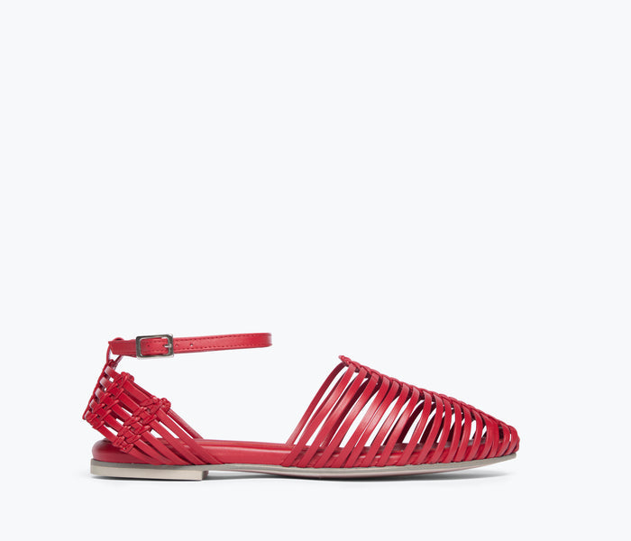 Red woven flat shoe from Freda Salvador's Blake Caged Woven Flat collection, showcasing a stylish cage design and comfortable flat sole.