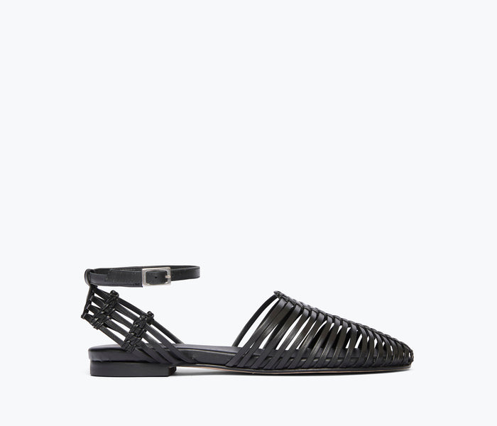 Freda Salvador Blake Black Caged Woven Flat shoe with open cut-out design and woven leather details, front view.
