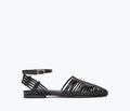 Freda Salvador Blake Black Caged Woven Flat shoe with open cut-out design and woven leather details, front view.