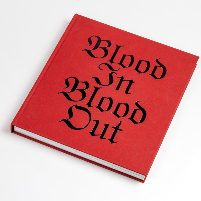 Second edition of Blood In Blood Out book. Initially published to commemorate the 30th anniversary of groundbreaking film originally released as Bound by Honor and featuring then up-and-coming Latino actors Jesse Borrego, Benjamin Bratt, and Damian Chapa. Edited by Jimmy Santiago Baca, Taylor Hackford and Merrick Morton. Poems by Jimmy Santiago Baca. Photography by Merrick Morton. Design by Stephen Serrato.