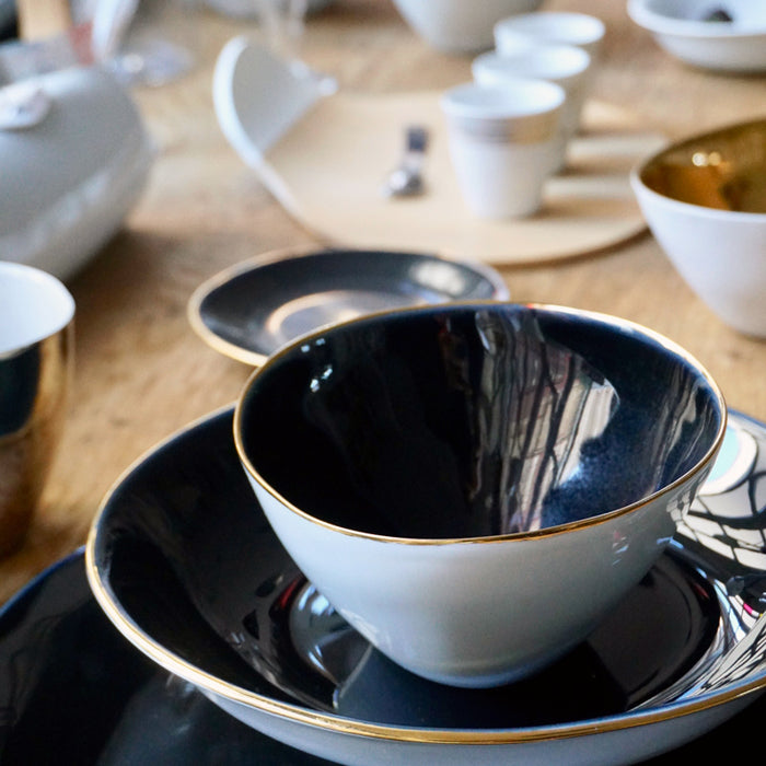 Vaisselle Tsé & Tsé en porcelaine blanche, noire et dorée