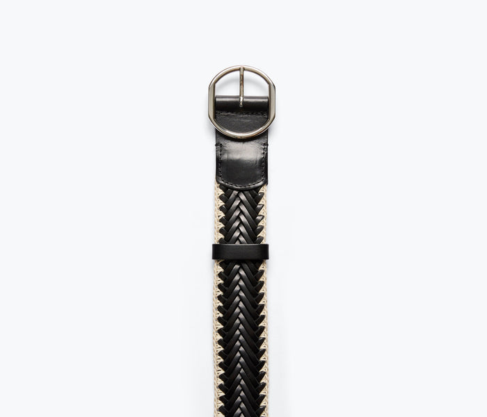 Black Brandy woven belt by Freda Salvador, showcasing intricate woven leather design and sturdy belt buckle.