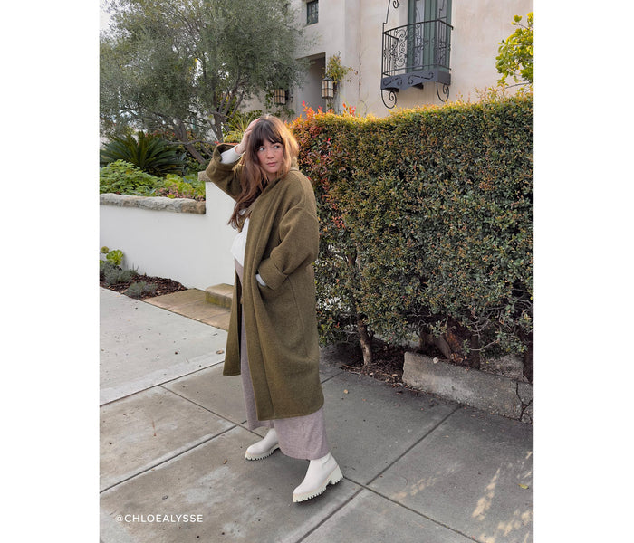 Cream Freda Salvador Brooke rain-resistant boot with a sleek design and waterproof material, suitable for wet weather.