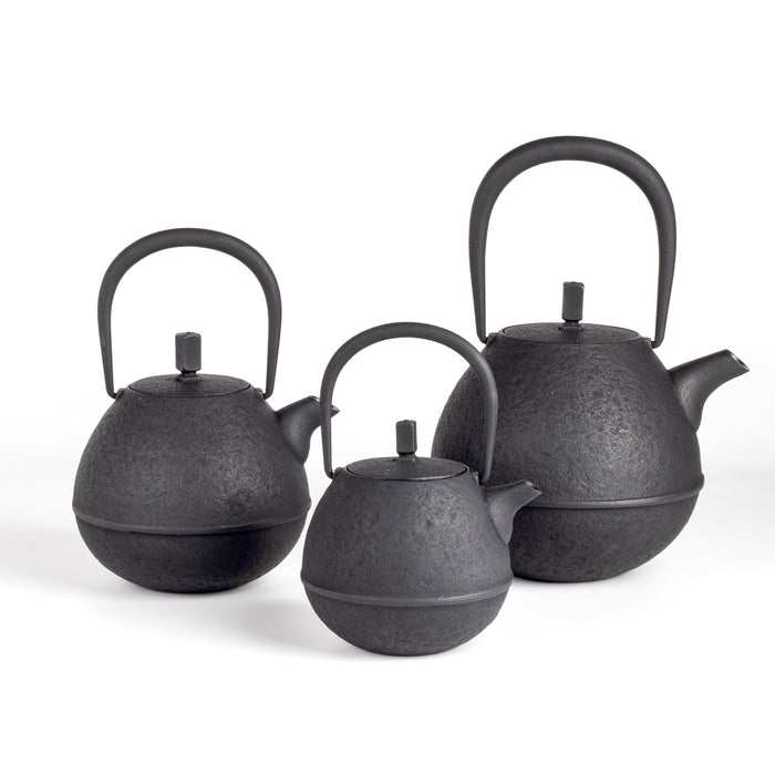 Small, medium and large Nambu Tetsu Cast Iron Teapots called Egg from Kukan Chuzo in Japan.