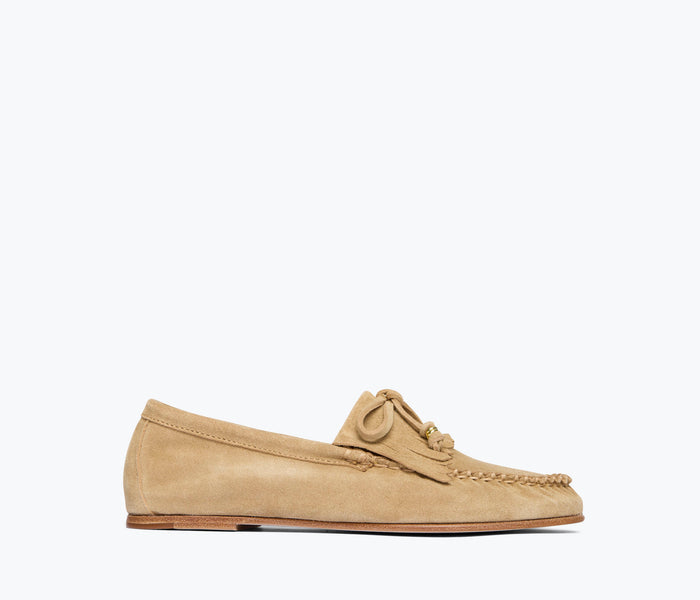 Fredas Salvador Celeste fringe suede loafer in stucco color with detailed front view showing fringe design and sleek silhouette.