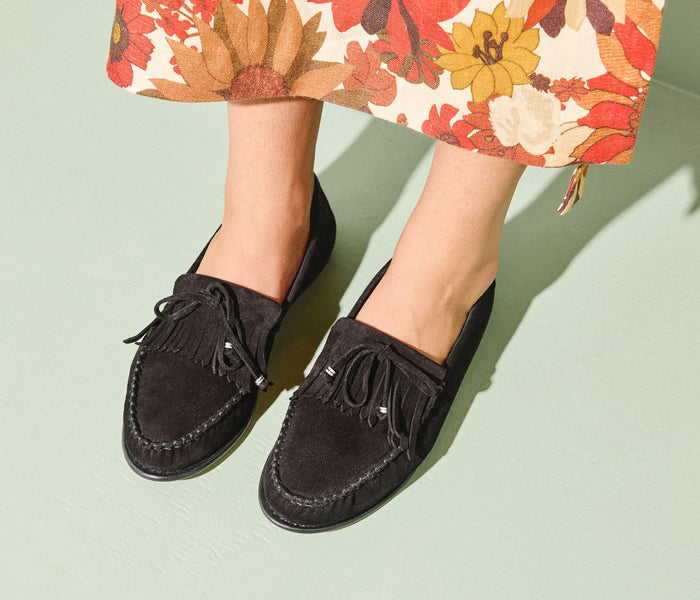 Black suede Celeste Fringe Loafer by FREDA SALVADOR with fringe detail and classic loafer design.