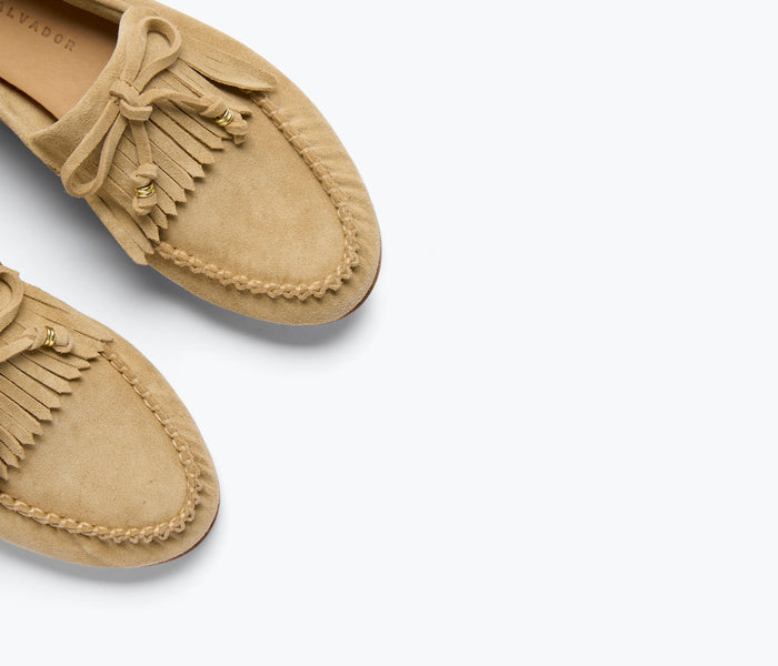 Freda Salvador Celeste fringe loafer in stucco suede with detailed fringe design and classic slip-on style.