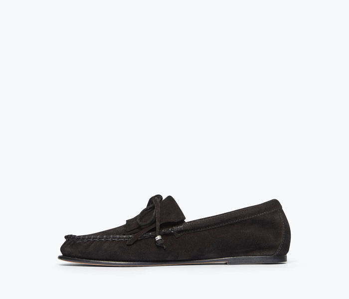 Black suede Celeste Fringe Loafer by FREDA SALVADOR with decorative fringe detail and slip-on design.