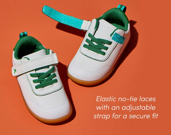 Top view of Ten Little Centre Court Sneakers featuring elastic no-tie laces with an adjustable strap for a secure fit. Available at www.tenlittle.ocm