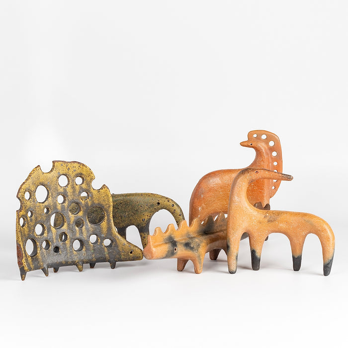 A mix of "one of a kind" ceramic creatures  in  red earthenware and red terra sigillata as well as in glazed stoneware made by Carol Horst in Los Angeles.