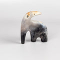 The ceramic creature is a one of a kind figurine formed from solid clay and refined by hand, this "one of a kind" ceramic creature is made out of white earthenware and white terra sigillata before getting pit fired in the wilderness. Made by Carol Horst in Los Angeles.