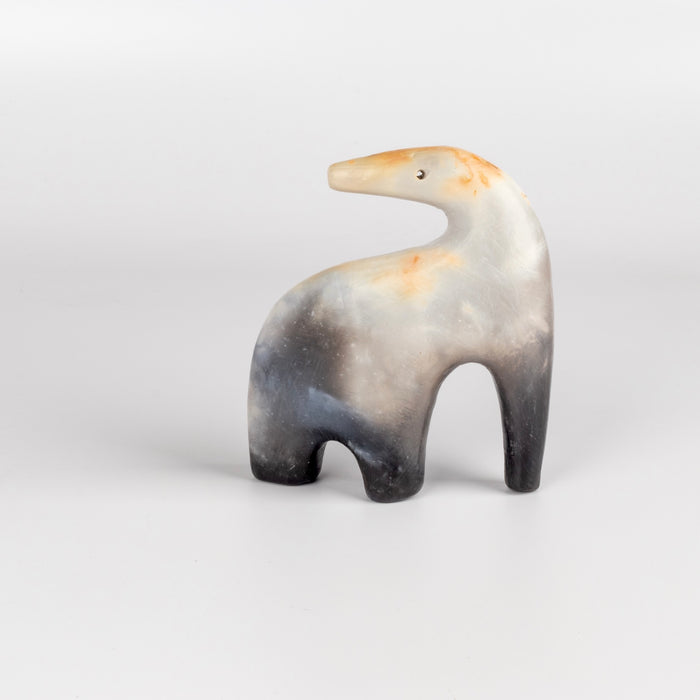 Other side of The ceramic creature  figurine made by Carol Horst.