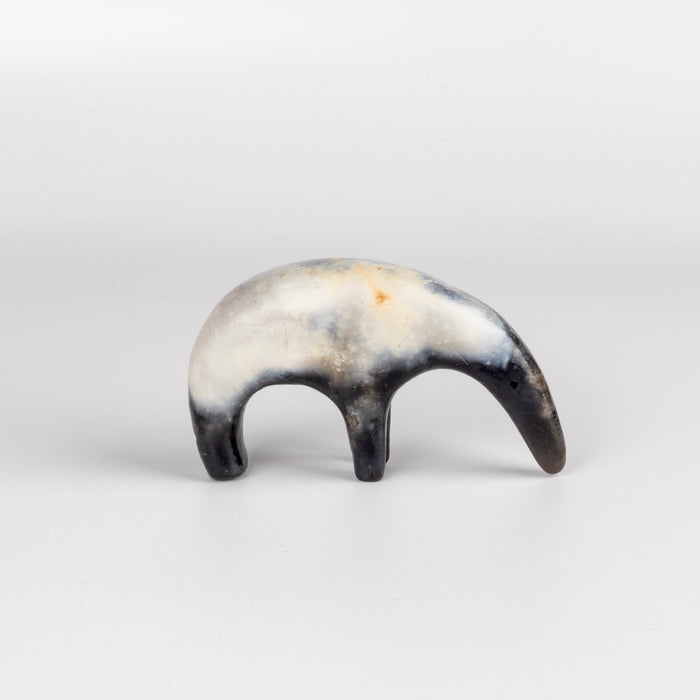 A one of a kind ceramic creature figurine made out of slab by hand and formed from solid clay and refined by hand, this "one of a kind" ceramic creature is made out of white earthenware and white terra sigillata before getting pit fired in the wilderness. Made by Carol Horst in Los Angeles.