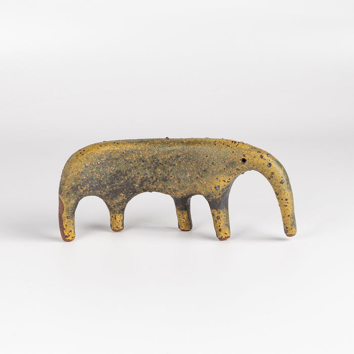 Other angle on "one of a kind" yellow ceramic creature by Carol Horst.