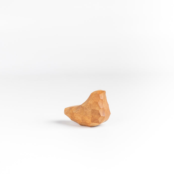 Small Carved Wood Bird "Chicchi" from Akihiro Woodworks is a hand carved bird in tabunoki wood that will sway back and forth when you push on it. Each bird is unique and may vary in color and the appearance of knots in the wood. Made by Akihiro Woodworks in Kagoshima, Japan.
