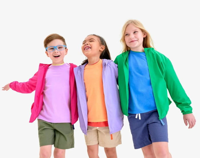 Children wearing Primary Chino Drawstring Shorts - Olive, Khaki, Sunwashed Navy. Available at www.tenlittle.com