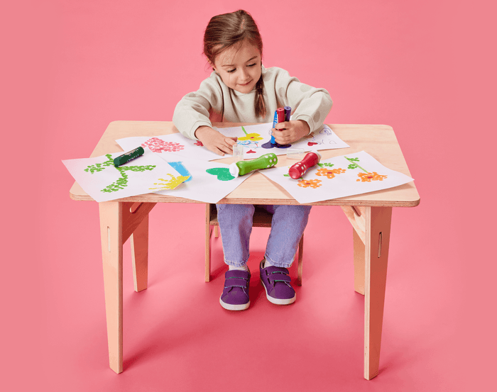 Child playing with Djeco Chunky Foam Markers for Little Hands - Set of 6. Available at www.tenlittle.com