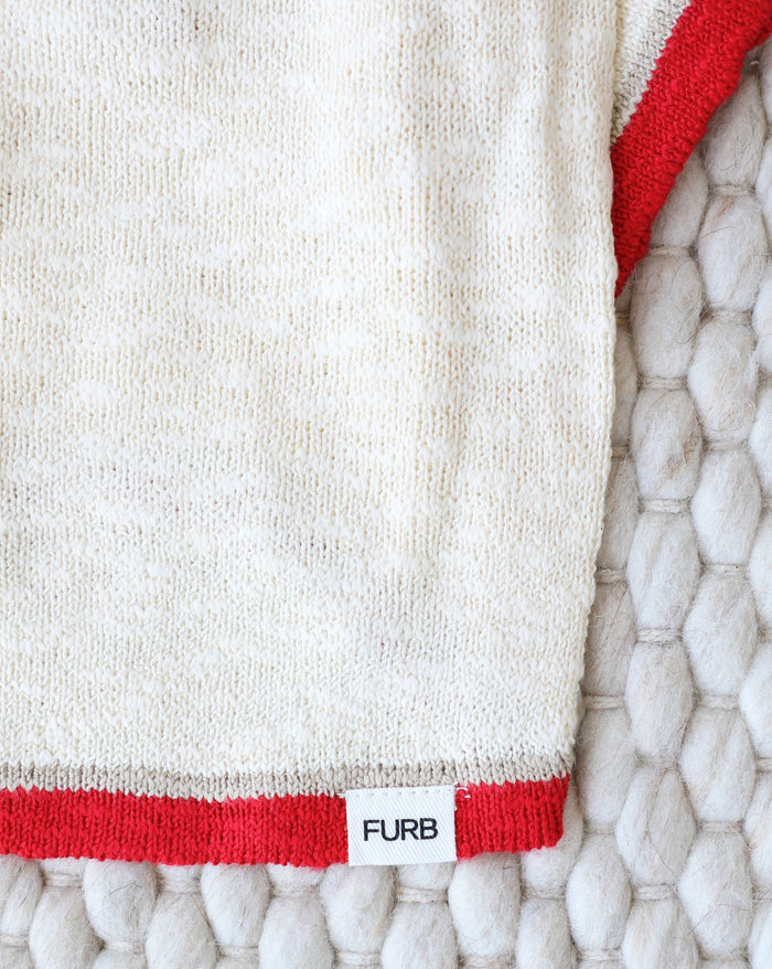 Cozy lightweight polo dog sweater with red and ivory styling and soft slub knit fabric for small to medium breed dogs