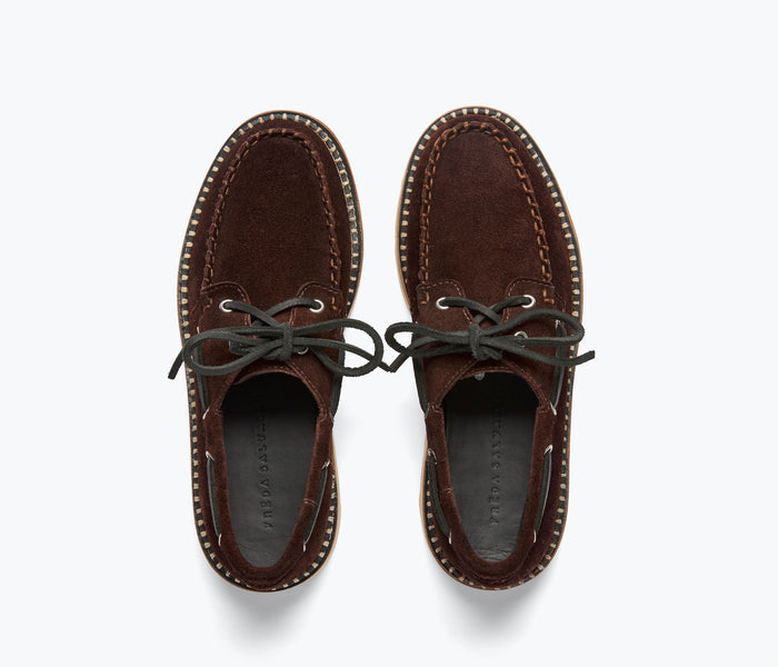 Freda Salvador Collins Lug Loafer in coffee suede with a rounded toe and slip-on design, stylishly displayed in the image.