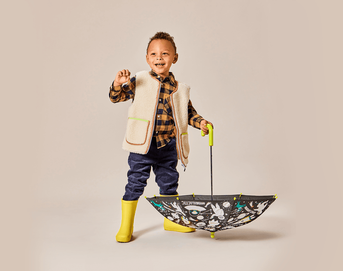 Little boy Holding Ten Little Color Changing Umbrella Space - Available at www.tenlittle.com